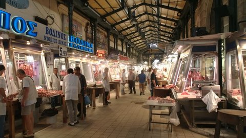 ATHENS, GREECE- SEPTEMBER, 16, 2016: wide view of butcher's stalls at athens central market in greece