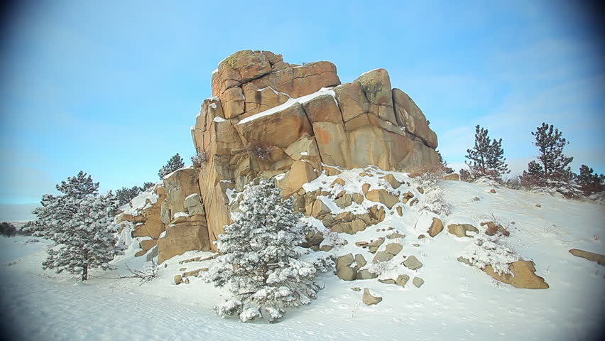 Winter Rock Formation with Pinetrees