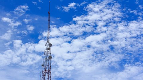 telecom pole, telecom tower time lapse with blue sky and cloud background 