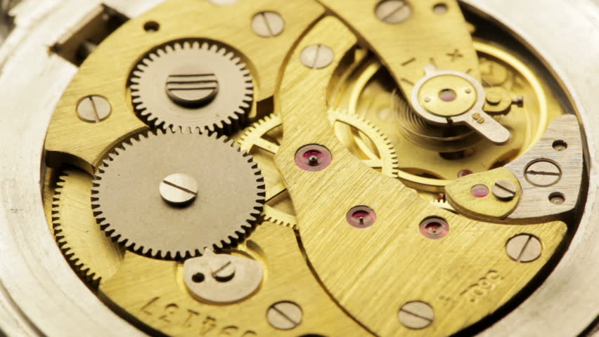 Moving metal gears inside working watch mechanism | Shutterstock HD Video #2018284