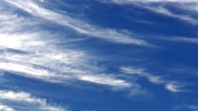 Sky with Clouds / Jet Streams / Clouds Timelapse. Light clouds in the blue summer sky with airplanes passing by. (av33393c)