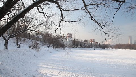 People walking at Novodevichy Convent  pond