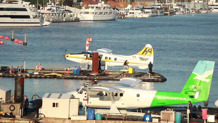 VANCOUVER, BC, CANADA - CIRCA 2011;Seaplane Backing Up on Water in Vancouver