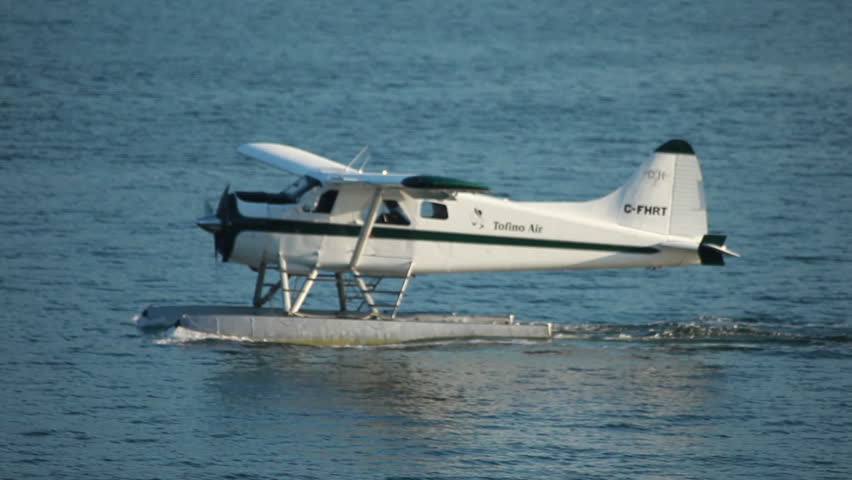 VANCOUVER, BC, CANADA - CIRCA 2011; Floatplane turning around on water