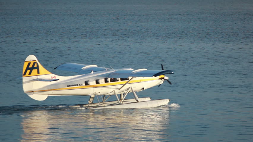 VANCOUVER, BC, CANADA - CIRCA 2011; Seaplane Taxiing on Vancouver Waters