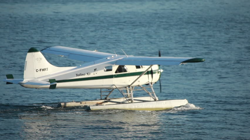 SEATTLE, WASHINGTON, USA - CIRCA 2011; Floatplane gliding on water