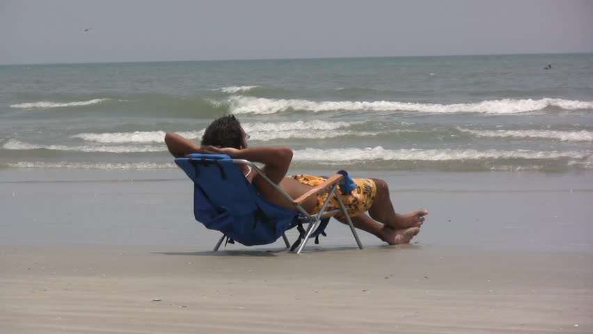 Guy In Beach Chair Stockvideoklipp Helt Royaltyfria 202030 Shutterstock