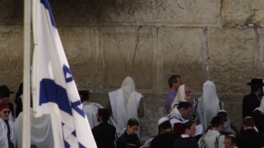 JERUSALEM, ISRAEL - CIRCA 2011; Male Jews at the Western Wall in Jerusalem