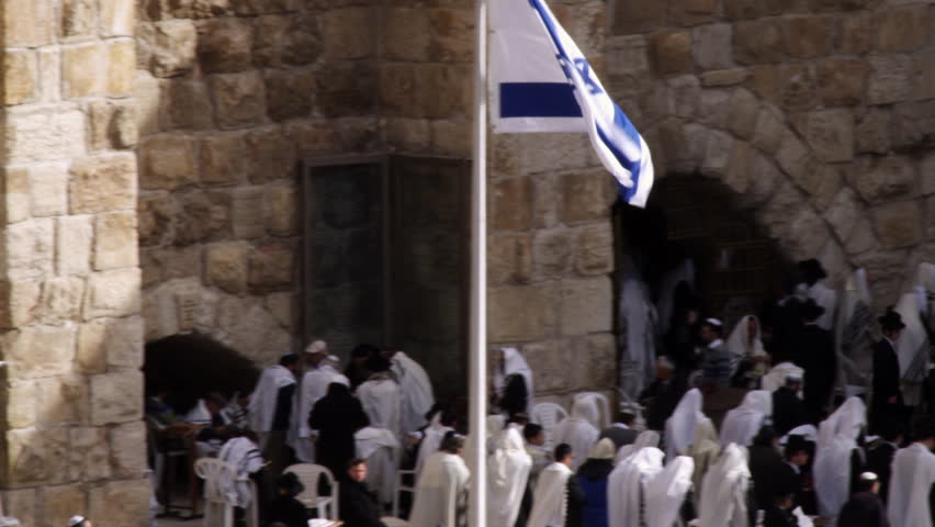 Jews at the Western Wall filmed in Israel.