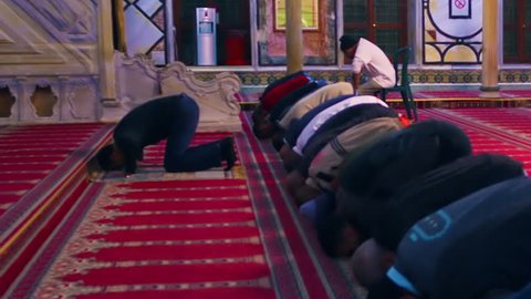 Kneeling muslim men filmed in Israel.