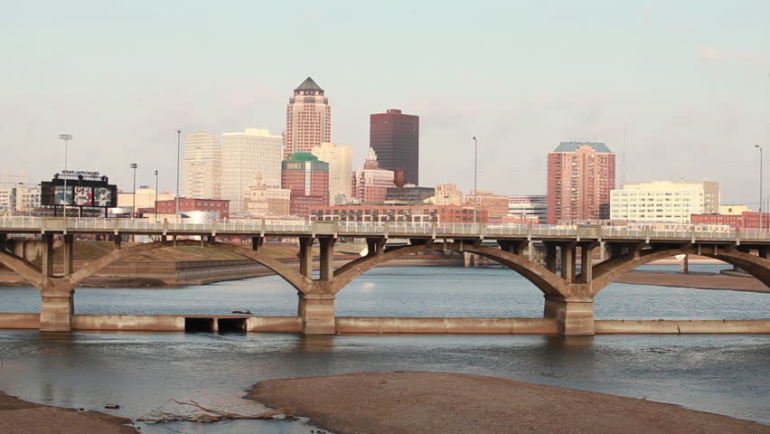 Des Moines cityscape with a river in the foreground.