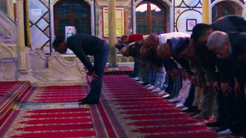 Muslim men praying at a mosque filmed in Israel.