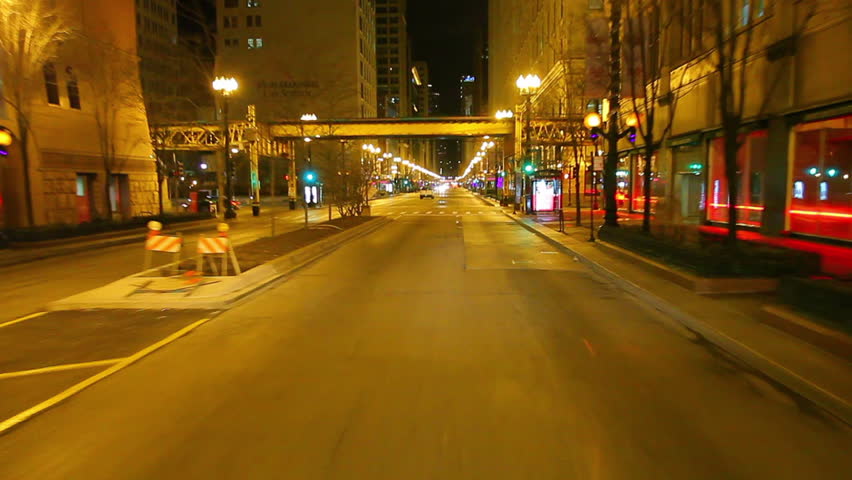 CHICAGO, ILLINOIS, USA - CIRCA 2011; Driving down the city street