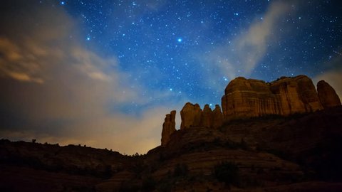 Astrophotography time lapse with zoom in motion of stars over Cathedral Rock in Sedona, Arizona