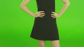 Attractive girl demonstrating different ways of emotions and poses on green screen . Shot on RED EPIC Cinema Camera in slow motion.