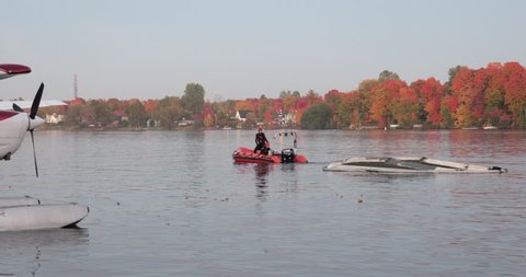 Quebec, Canada - October 2016 - Float plane crashes upon landing in waters.