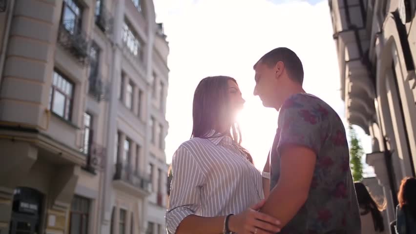 Couple embracing on the city buildings background. | Shutterstock HD Video #20235175
