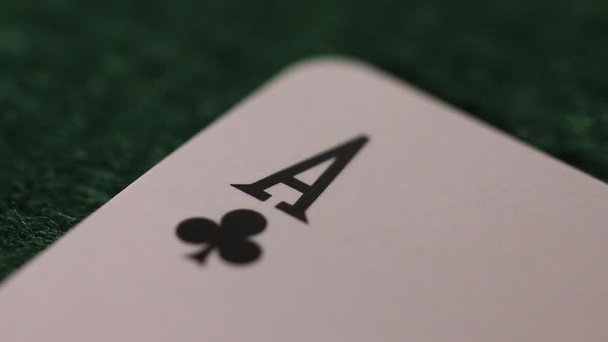 Close up track of aces card