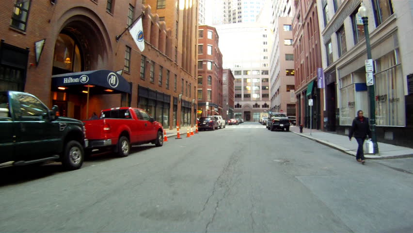 BOSTON, MASSACHUSETTS, USA - CIRCA 2011; Driving by traffic cones in Boston, MA