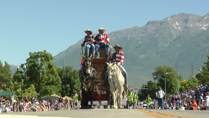 UTAH - CIRCA 2011: Unidentified people on a covered wagon in a parade circa 2011
