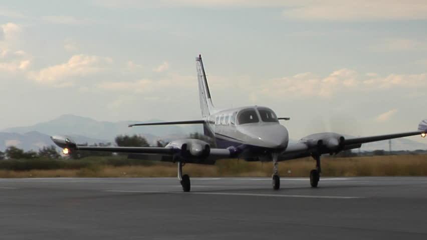Airplane Taxiing On Runway