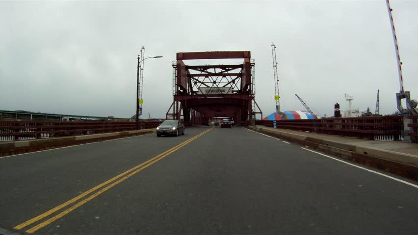 BOSTON, MASSACHUSETTS, USA - CIRCA 2011; Driving over a Boston bridge