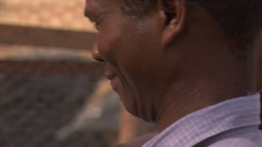 Kenya - Circa 2006: Close up view of unidentified men's faces circa 2006 in