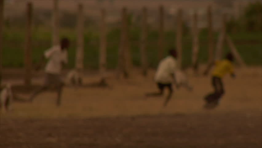 Kenya - Circa 2006: Slow motion view of unidentified children as they play