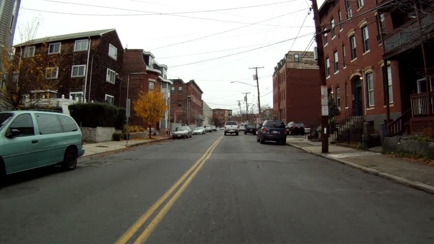 BOSTON, MASSACHUSETTS, USA - CIRCA 2011; Driving in a Boston suburb