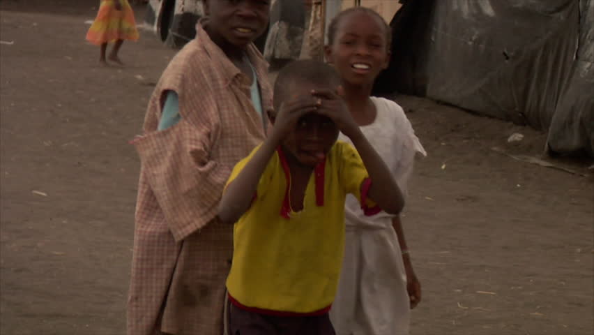 KENYA - CIRCA 2006: Unidentified African boys walk on the road circa 2006 in