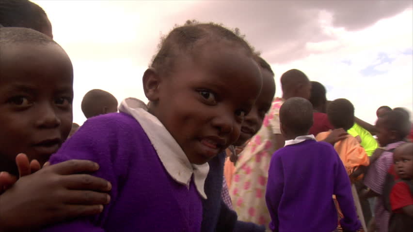 KENYA - CIRCA 2006: Unidentified kids look and smile at the camera circa 2006 in
