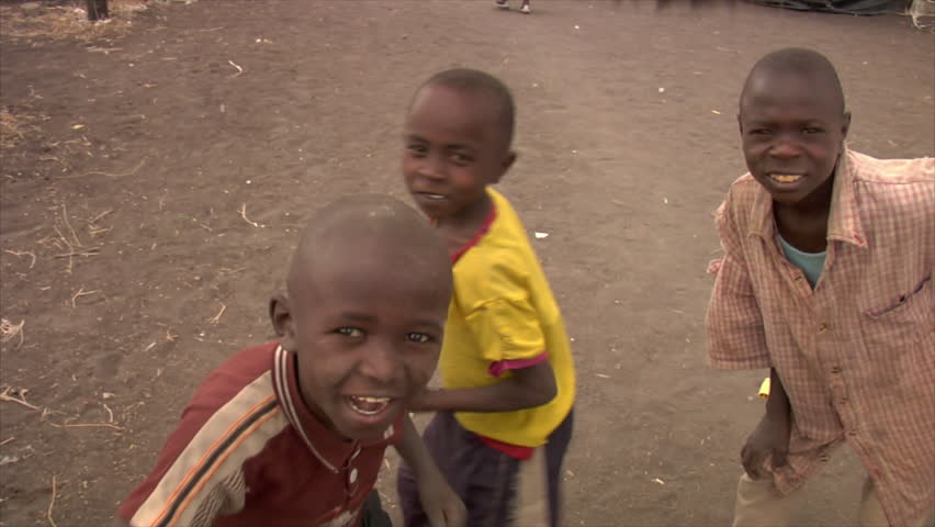 KENYA - CIRCA 2006: African boys walk down a road circa 2006 in Kenya.