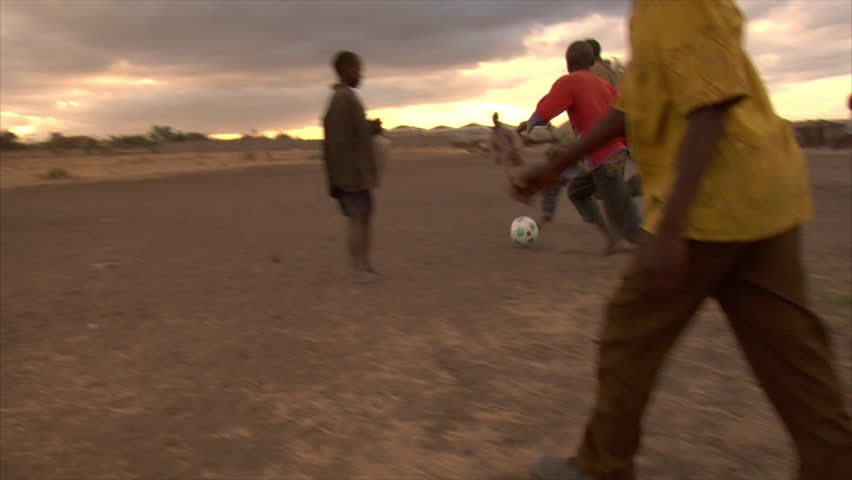 KENYA - CIRCA 2006: Unidentified group of kids play soccer circa 2006 in Kenya.