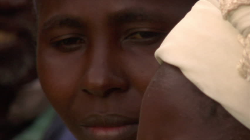 KENYA - CIRCA 2006: Close up of an unidentified lady in a group of people circa