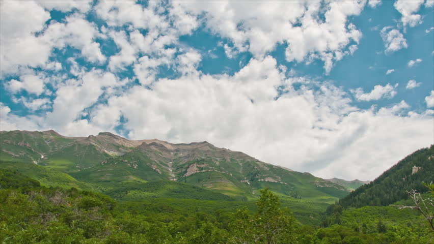 Mountain time-lapse with clouds.
