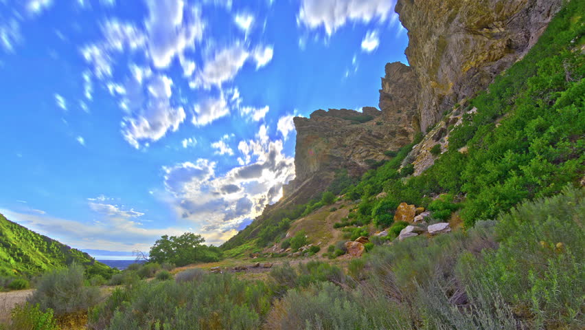 Time-lapse of lush canyon.