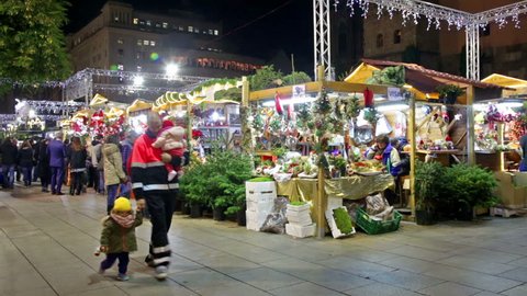 BARCELONA, SPAIN - DECEMBER 1, 2015: Traditional Christmas fair near Cathedral   in evening. Barcelona, Catalonia.