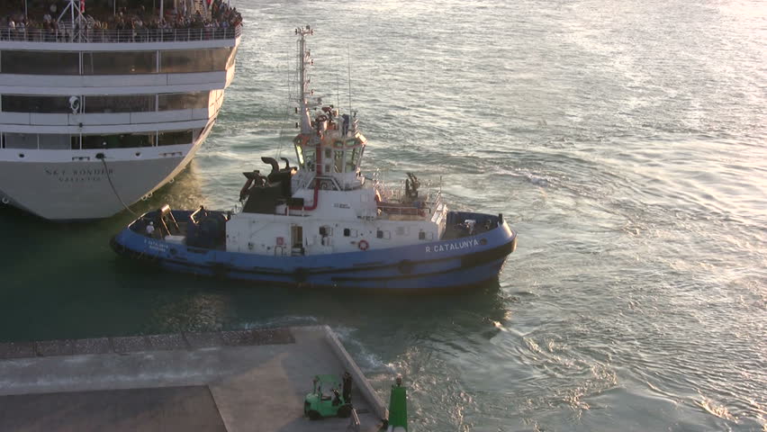 Tug near big ship