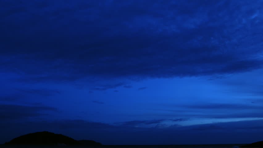 tropical sunrise with cloudy sky and sea