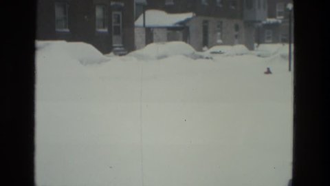 FRANCE 1978: street and cars in the city completely covered by deep fresh snow