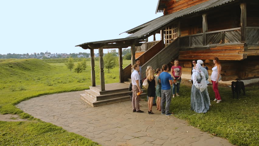 tourists near the wooden Church