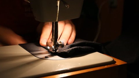 
electric sewing machine at work