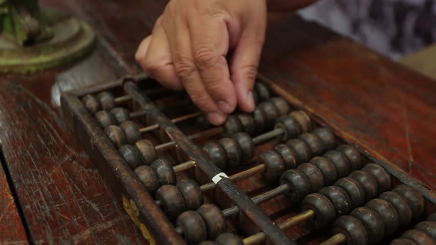 chinese abacus is a calculating tool used primarily in parts of Asia for performing arithmetic processes. The abacus was in use centuries before the adoption of the written modern numeral system. Royalty-Free Stock Footage #20269336