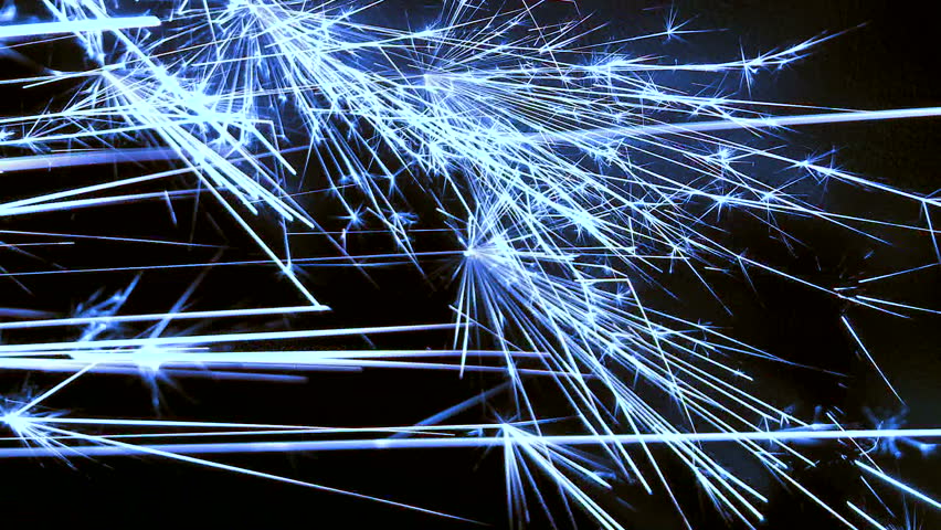 Electric blue sparks shooting across frame