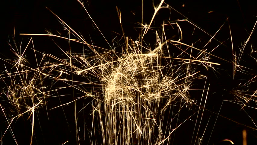 Sparks shooting up into frame