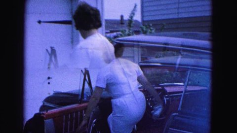 WILLIAMSBURG 1964: a car is seen