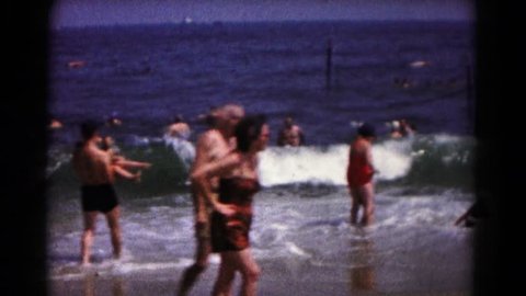 HAGERSTOWN, MARYLAND 1961: a beach scene is seen