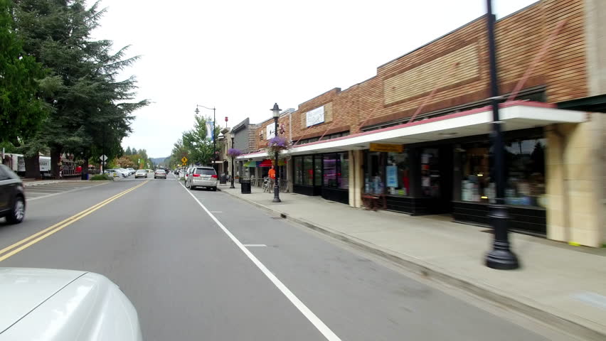 Driving Through Snoqualmie, Washington Downtown Looking Out Passenger Window - Stablized Gimbal Shot