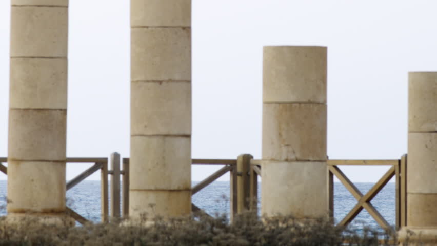 Old columns on the seashore shot in Israel.