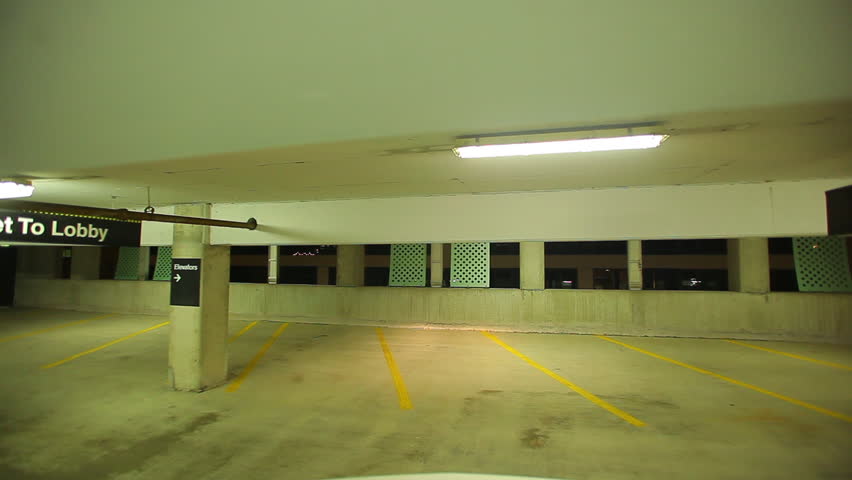 Car exiting parking garage
